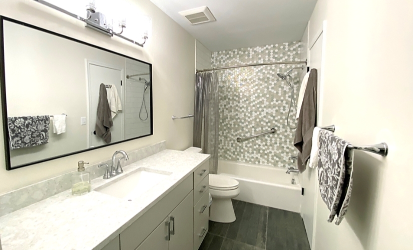 This bathroom located in Ann Arbor uses Atlas pulls,Capital Lighting,DalTile,Delta,Eternity,Gatco,Kohler,Marsh Cabinets,Milseno,Moen,Oceanside Glass,Sherwin Williams,Solid Surfaces Unlimited