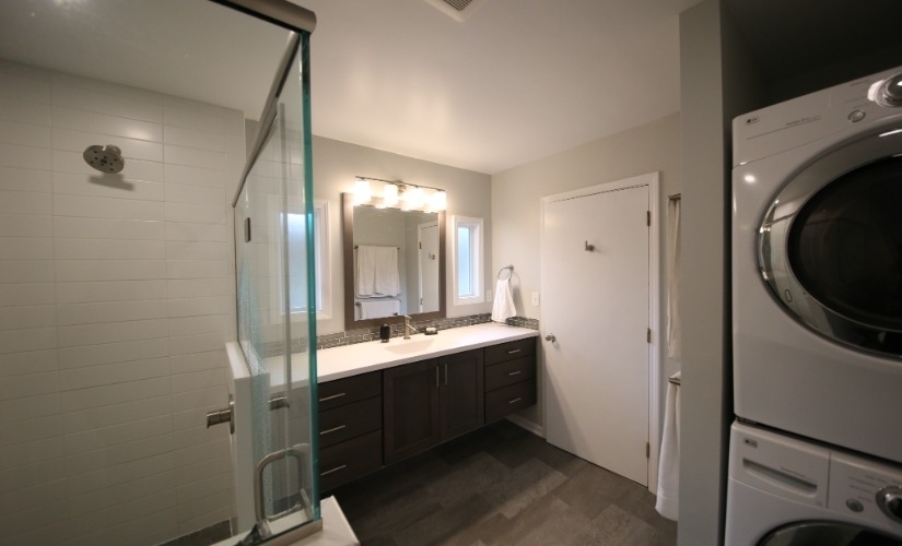 This bathroom located in Ann Arbor uses DalTile,Delta,Glazzio,Mannington,Onyx,Progress Lighting,Sherwin Williams,Showplace Cabinets,Top Knobs,Toto